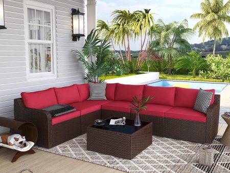 7 Pcs Patio Rattan Sofa Set w  Ergonomic Curved Armrest, Red Cushion & Coffee Table For Sale